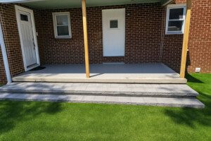 new patio, manicured lawn